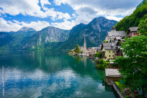 Popular beautiful village in Austria , Hallstatt from the view point with the green summer scenery and crystal clear water