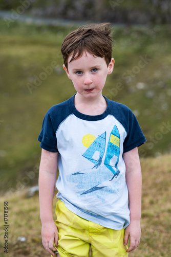Boy walking up the Slieve League Cliffs, County Donegal, Ireland © Chris