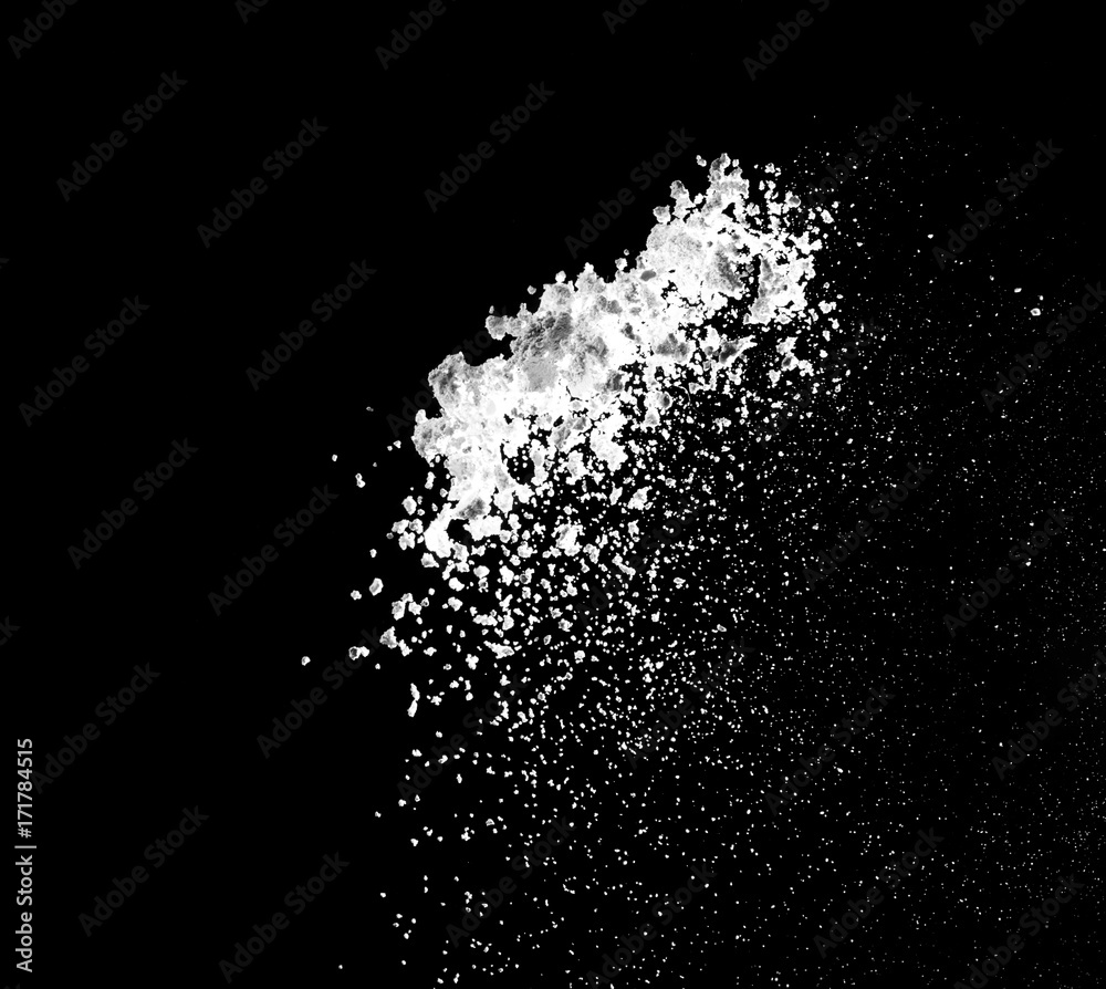 white powder explosion isolated on black background for graphic resources