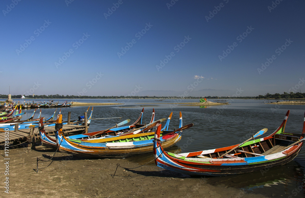 The local boat in Taungthaman Lake near U Bein Bridge in Amarapura, Myanmar (Burma)