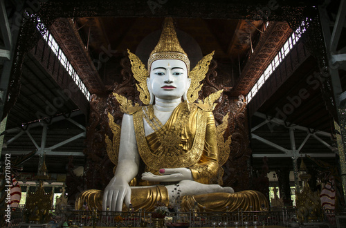 Buddha in gold, royal clothes,Ngar Htat Gyee pagoda,Yangon, Myanmar(Burma) photo