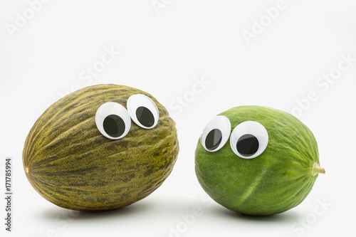 Crazy brown and green melon with googly eyes on white background  - comics ready