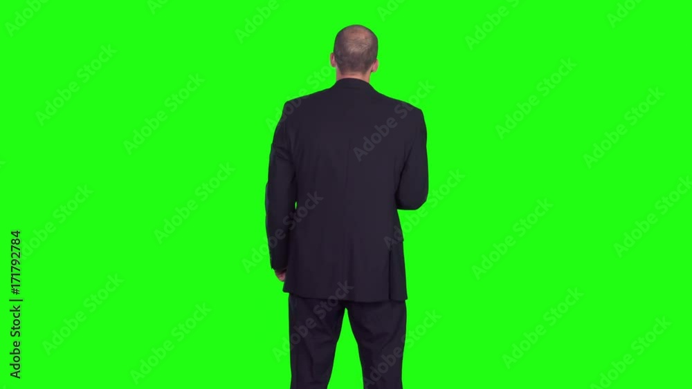 Green screen chromakey of businessman swiping from a digital tablet to a heads up display, then swiping and clicking on HUD. Shot in 4K UHD. See my portfolio for a reverse angle. Green screen chromakey of businessman swiping from a digital tablet to a heads up display, then swiping and clicking on HUD. Shot in 4K UHD. See my portfolio for a reverse angle.