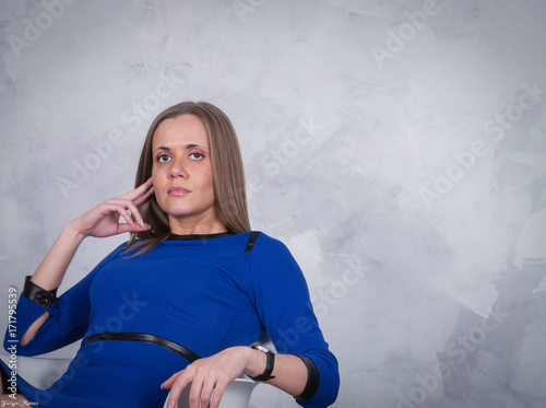 business woman in a blue dress photo