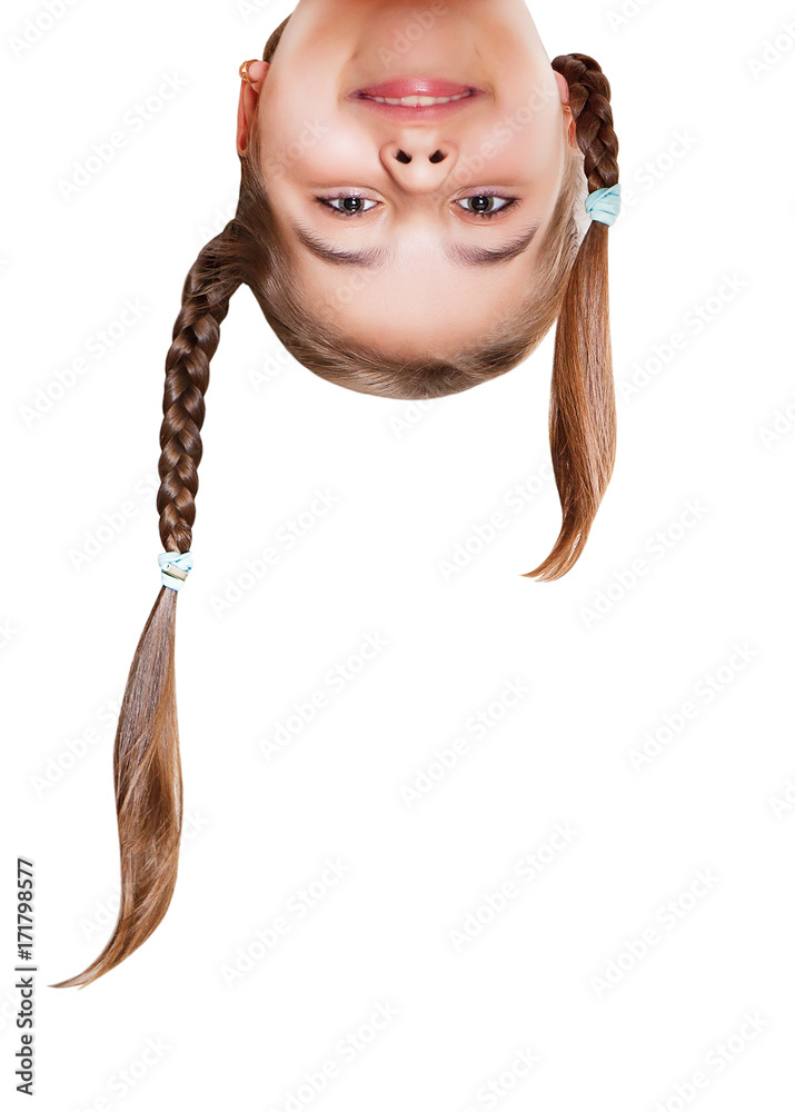 Funny girl with pigtails upside down . Insulated head closeup portrait on white background. Stock Photo | Adobe Stock Funny girl with pigtails upside down . Insulated head closeup portrait on white background. Stock Photo | Adobe Stock