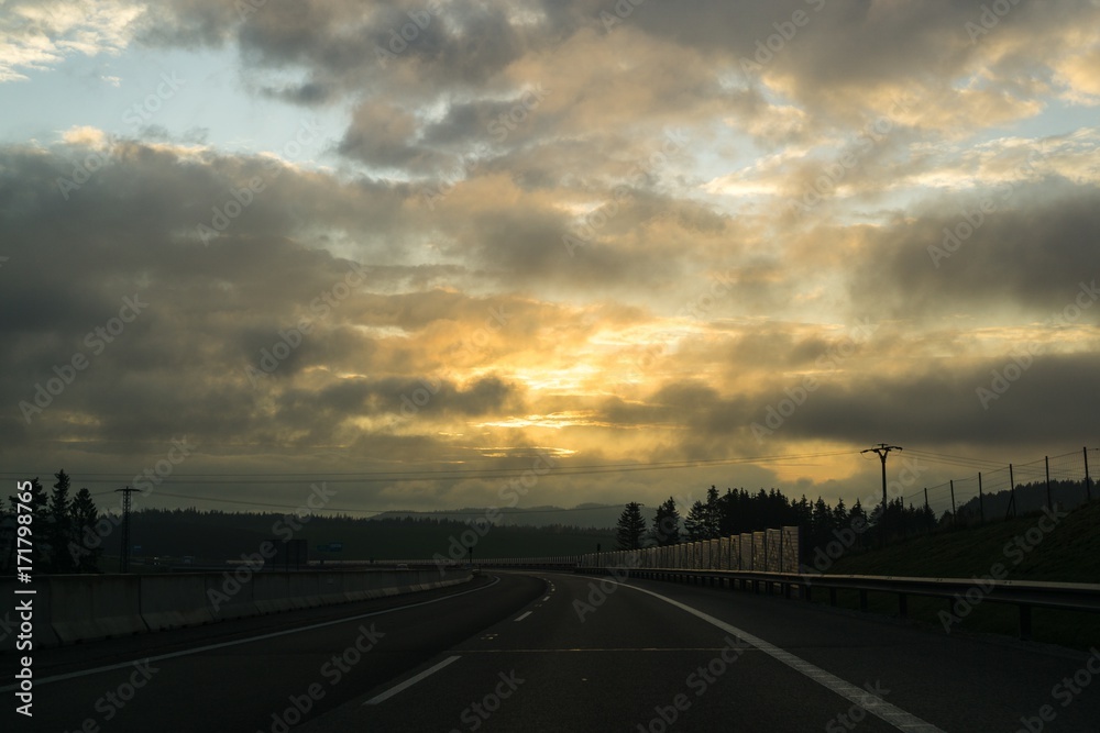 Misty morning sunrise on the road. Slovakia