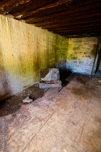An old chair in an abandoned military fort near the coast in croatia © Horiius