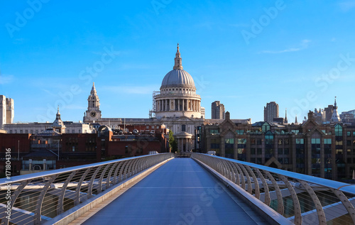 Fototapeta Naklejka Na Ścianę i Meble -  The view of the dome of Saint Paul's Cathedral and Millenium bridge, City of London.