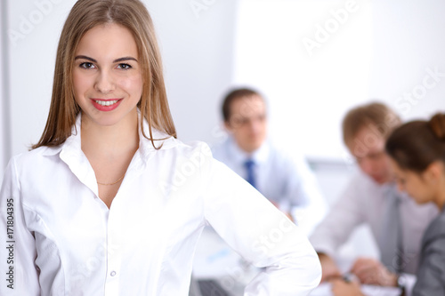 Beautiful business woman at meeting 