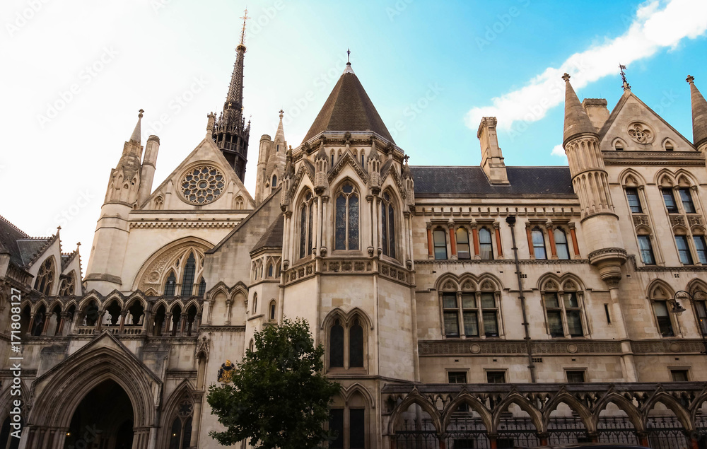 Historical building and entrance of Royal Courts of Justice in London ,England.