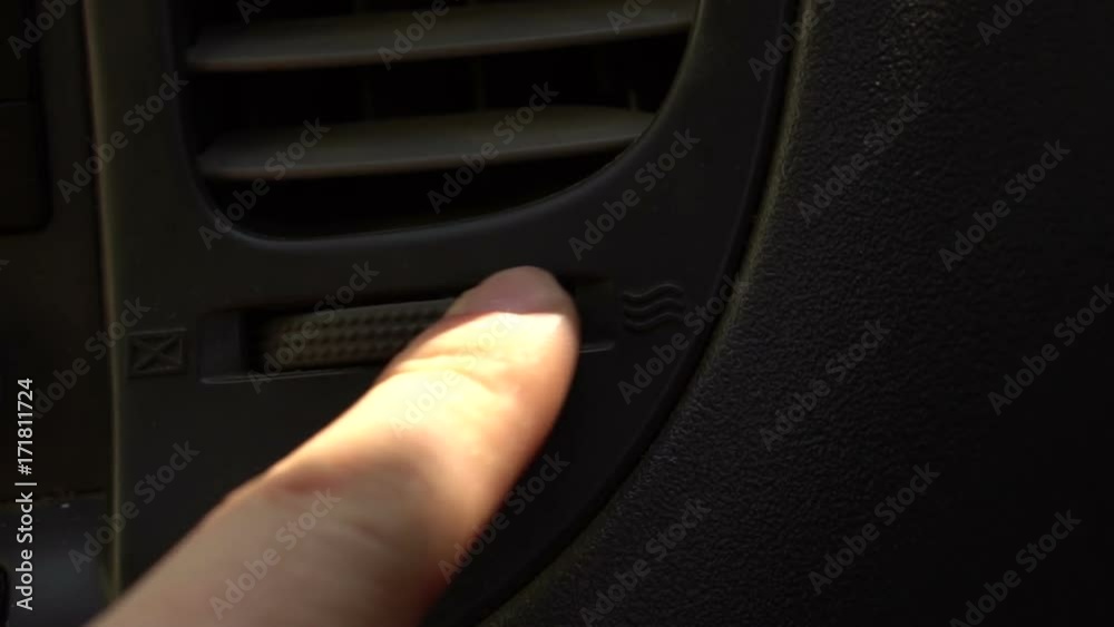 adjustment of the ventilation system in the car. close-up. Slow motion adjustment of the ventilation system in the car. close-up. Slow motion