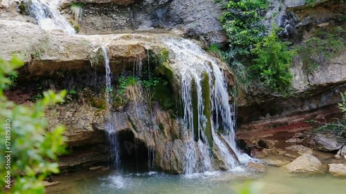 Waterfall in Catalonia surrounded by beautiful forests and valleys
