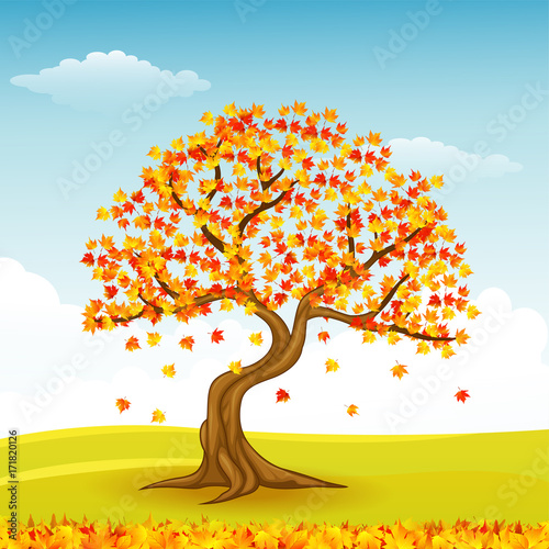 Autumn tree with falling leaves