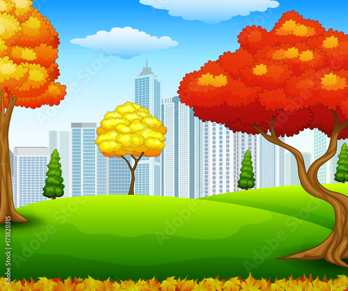 Autumn city park with building background