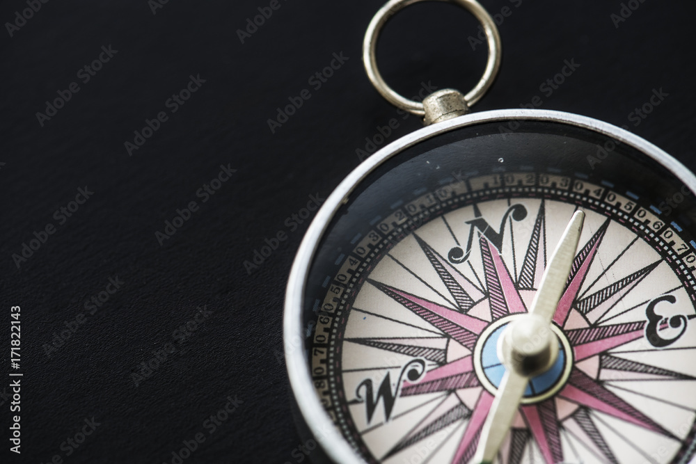 Closeup of compass navigation tool isolated Closeup of compass navigation tool isolated