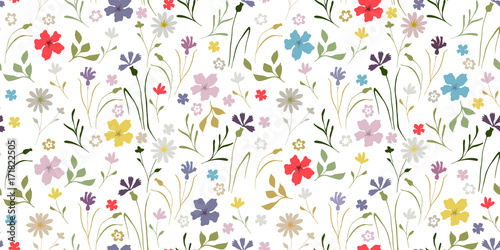Cute pattern in small flowers. Floral seamless background for fabric, wallpaper, wrapping, paper. photo