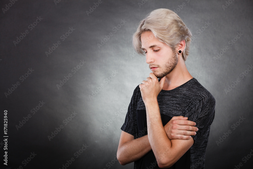 Young man thinking seek a solution Young man thinking seek a solution