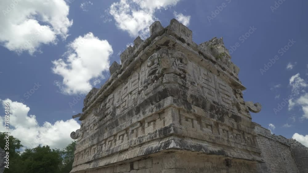 High maya column of Kukulkan in Mexico. Ancient architecture symbol at summer sunny day High maya column of Kukulkan in Mexico. Ancient architecture symbol at summer sunny day