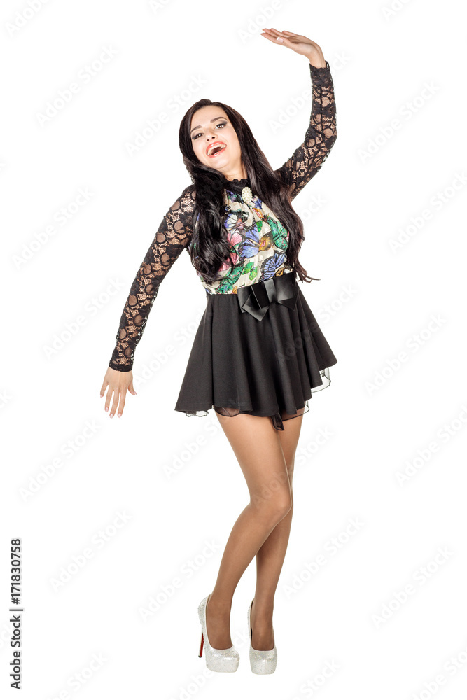 woman in black dress having fun and dancing. people, holidays, party and night lifestyle concept. Image on a white background.