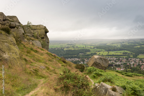 Cow and Calf overlooking township of Ilkley in Yorkshire