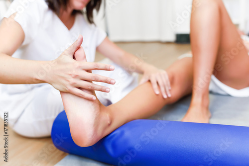 Medical check at the legs in a physiotherapy center.