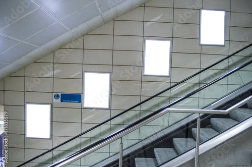 Blank billboard in subway station