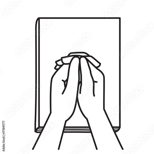 Holding hands praying on Bible