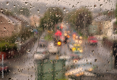 Swansea, one of the wettest cities in Britain, as seen through a window onto traffic lights. photo