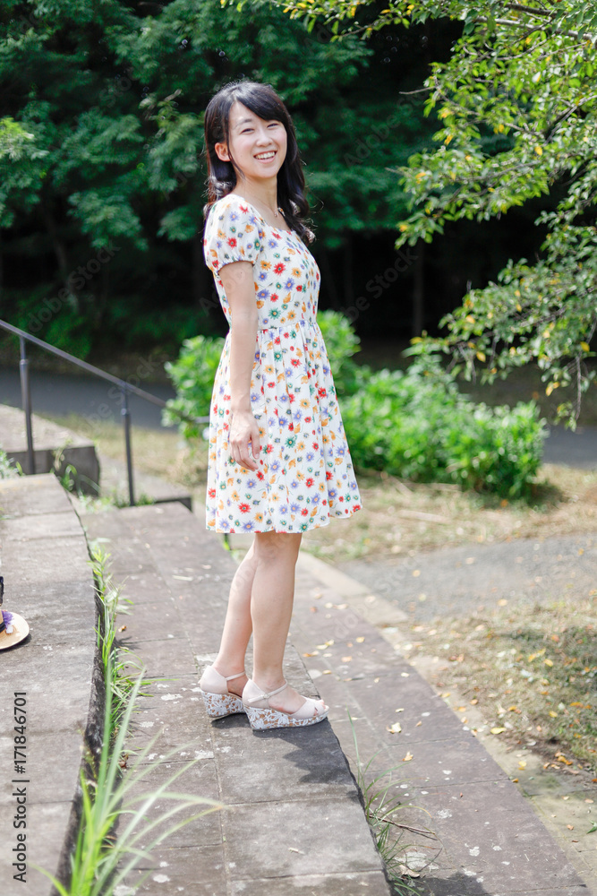 a portrait of beautiful woman in the park a portrait of beautiful woman in the park