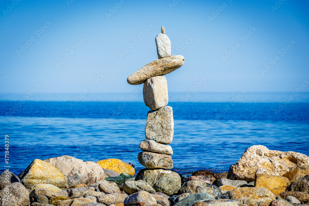 Cairn on the beach of Catarelli,a cairn is a human-made pile (or stack) of stones. Cairns have been and are used for a broad variety of purposes, from prehistoric times to the present. Cairn on the beach of Catarelli,a cairn is a human-made pile (or stack) of stones. Cairns have been and are used for a broad variety of purposes, from prehistoric times to the present.