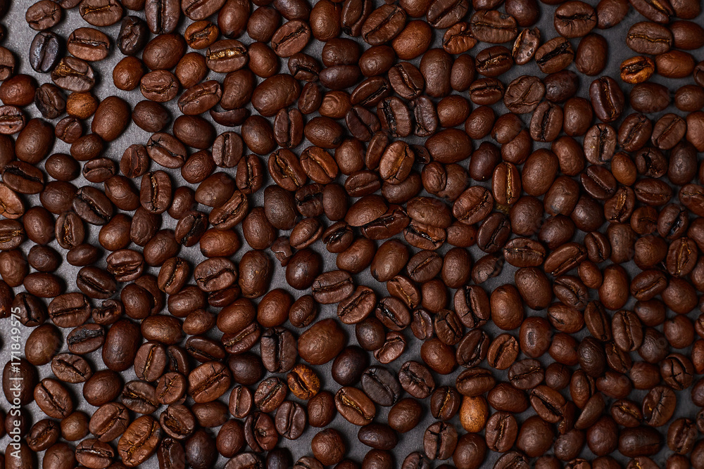 Fototapeta premium Coffee beans on black background