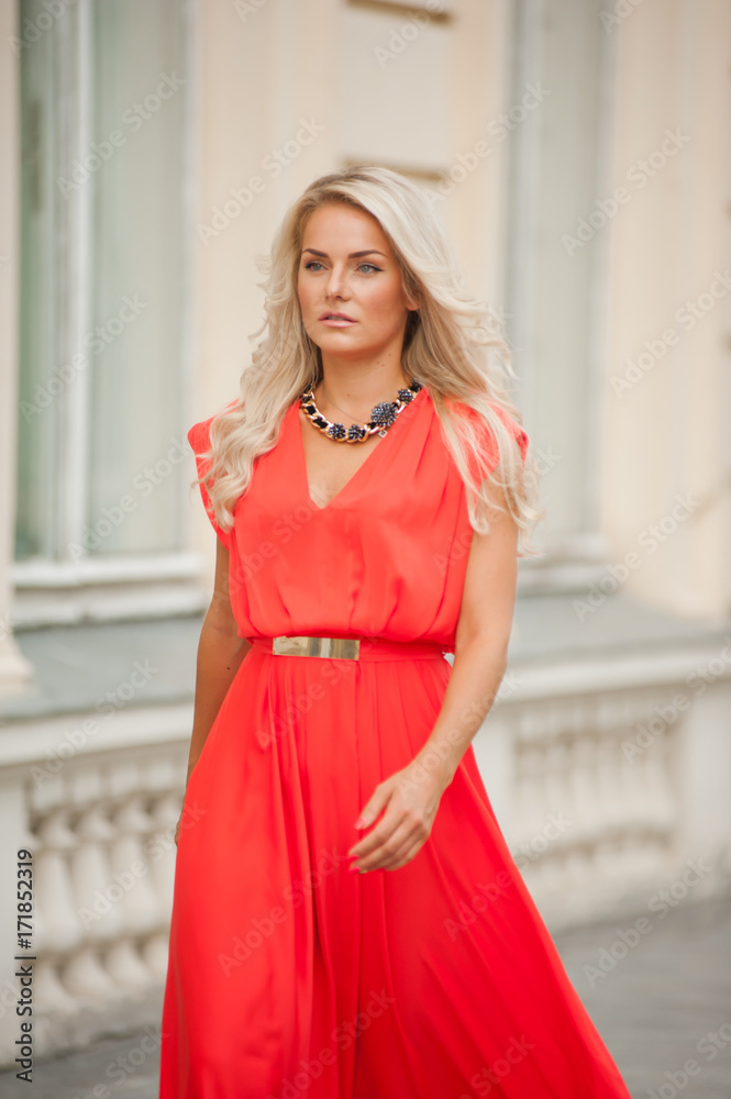 Woman in red dress outdoor