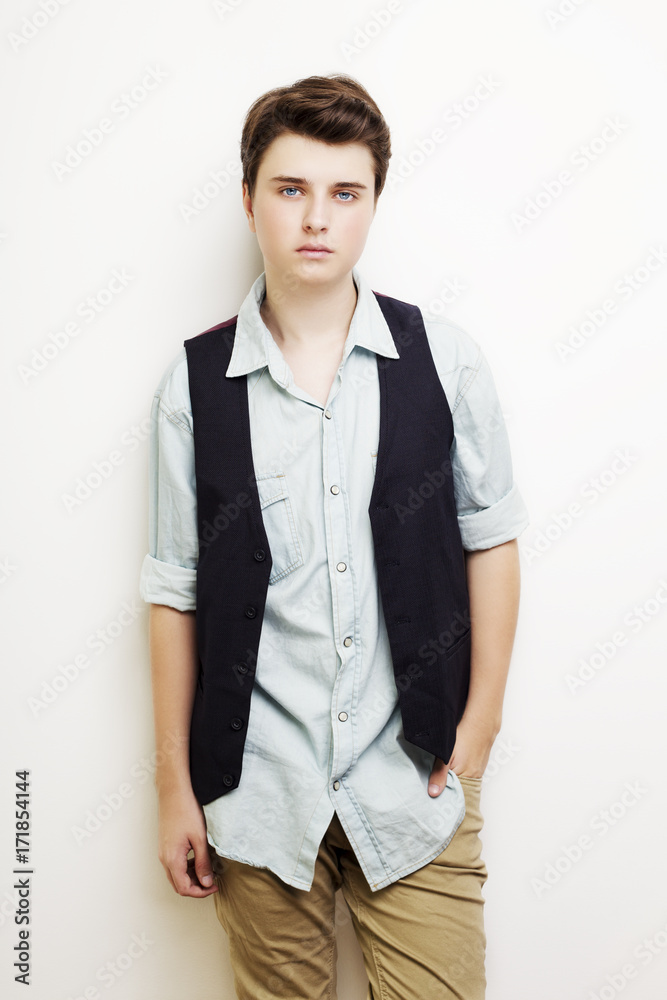 Stylish handsome young man posing. Studio shot