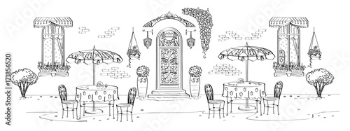 Set with a street panorama, a painted cafe with umbrellas on an ancient street with a door, windows, pots, plants and a relaxing atmosphere.