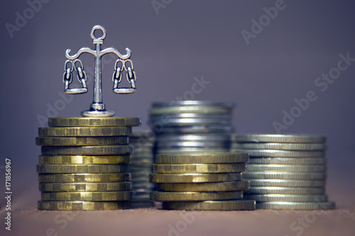scales of justice and money
