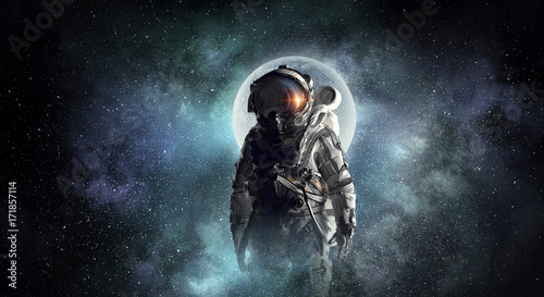 Fototapeta Naklejka Na Ścianę i Meble -  Astronaut explorer in space. Mixed media