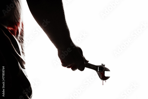 Attack with a wrench. Hand with a hammer. Murder with a wrench.