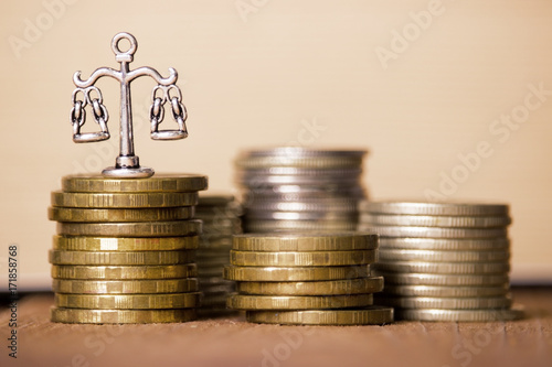 scales of justice and money