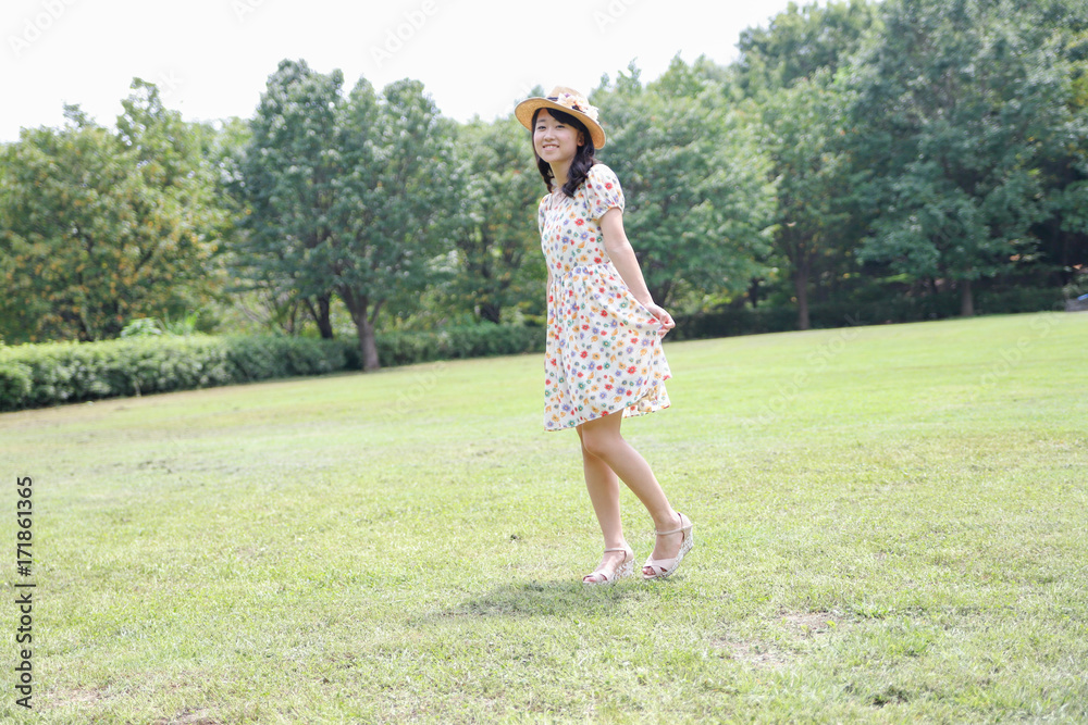 a portrait of beautiful woman in the park a portrait of beautiful woman in the park