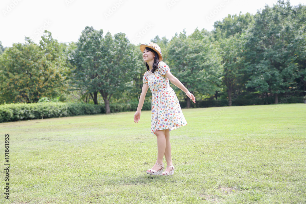 a portrait of beautiful woman in the park a portrait of beautiful woman in the park