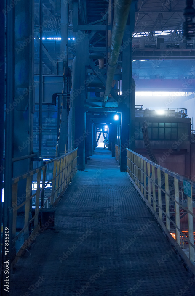 Fototapeta premium An aisle in a factory workshop