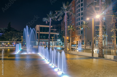 Albania. Durres. Evening central square with fountains, colorful illumination