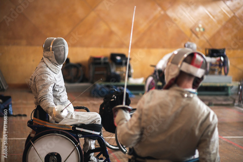 Принти на полотні disabled fencers and their trainer at workout