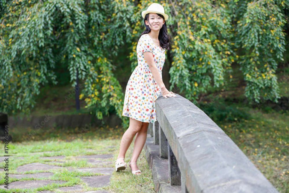 a portrait of beautiful woman in the park a portrait of beautiful woman in the park