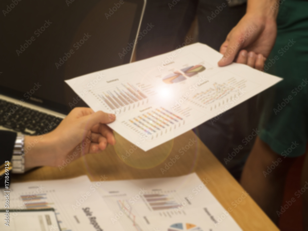 Naklejka premium The paper work at office hour,investment chart and office work,busy hour work time of the business worker