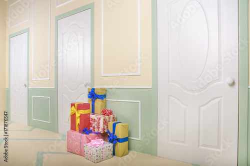 gift boxes go under the door in a bright room