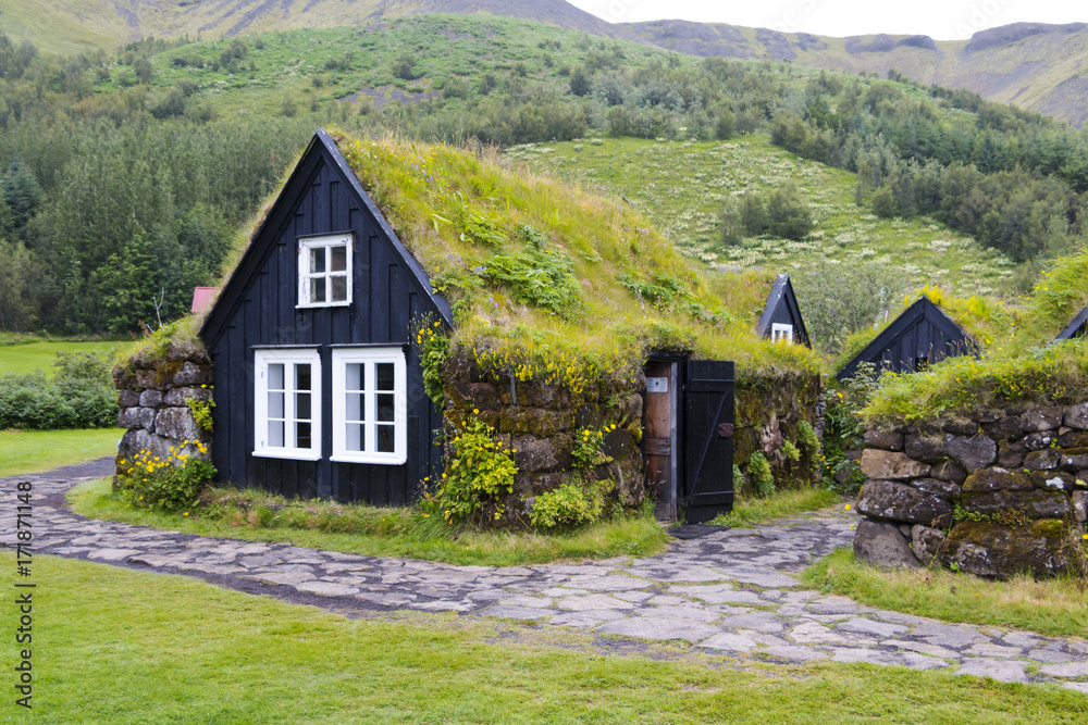 Traditional Icelandic House with grass roof in Skogar Folk Museum, Iceland - obrazy, fototapety, plakaty 