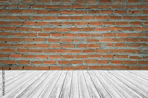 Red Brick wall texture surface with Wood terrace