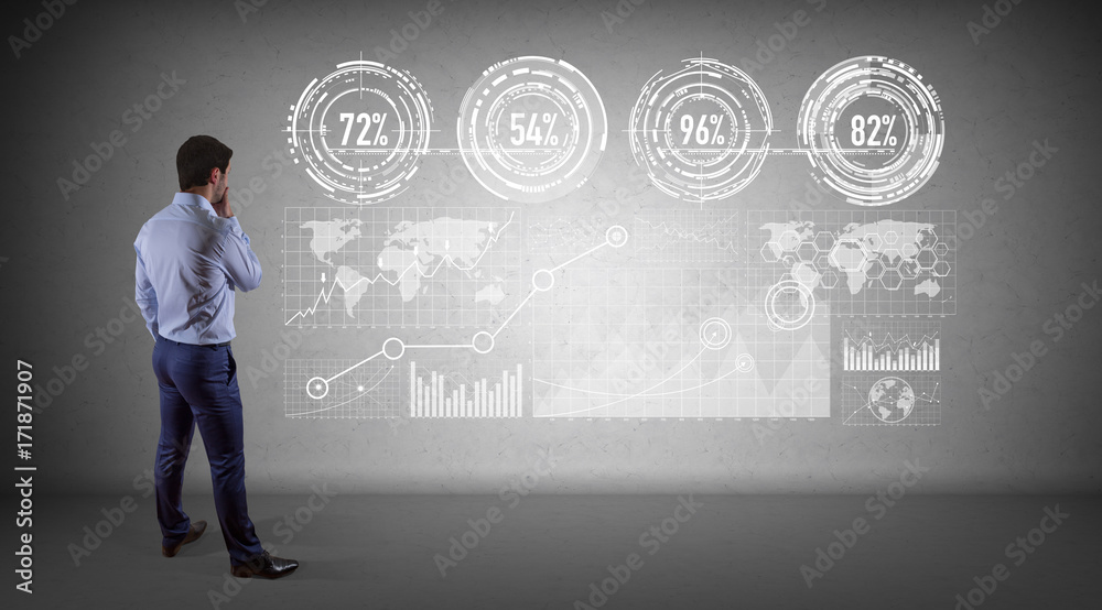 Businessman using graph screens interface on a wall 3D rendering Businessman using graph screens interface on a wall 3D rendering