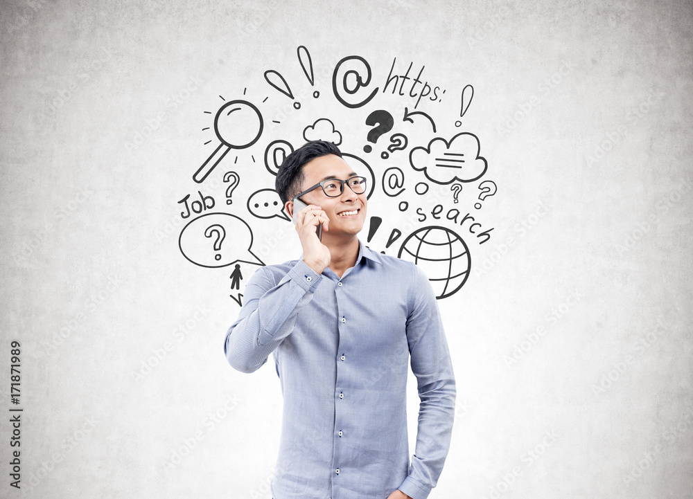 Asian businessman on phone, internet search Asian businessman on phone, internet search